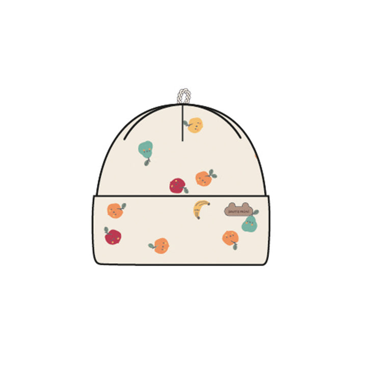 Bonnet crème à motifs fruités, naissance