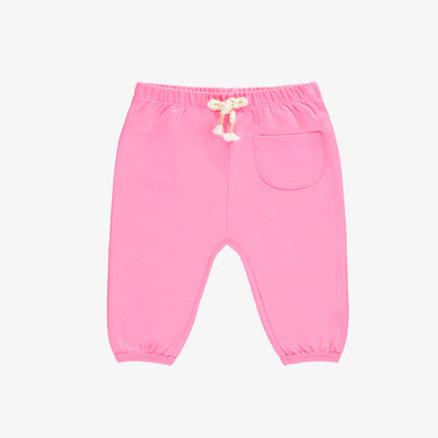 Pantalon rose style jogger, naissance
