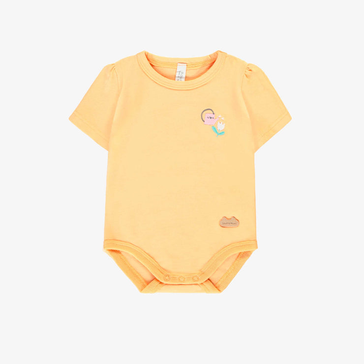 Cache-couche orange avec illustration, naissance