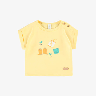 Short jaune à motifs, naissance 