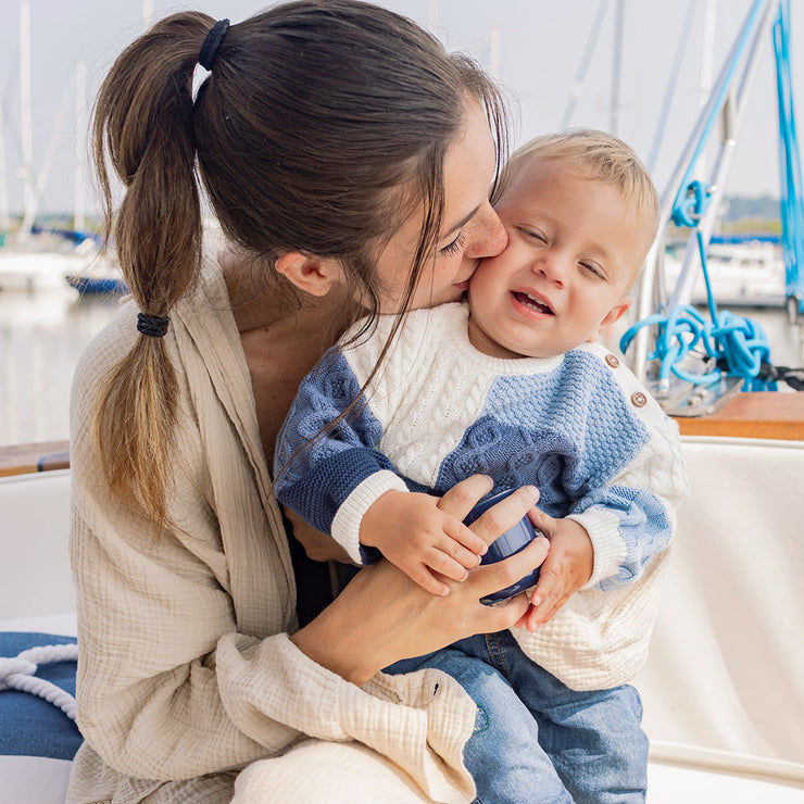 Chandail de tricot crème et bleu effet patchwork, naissance