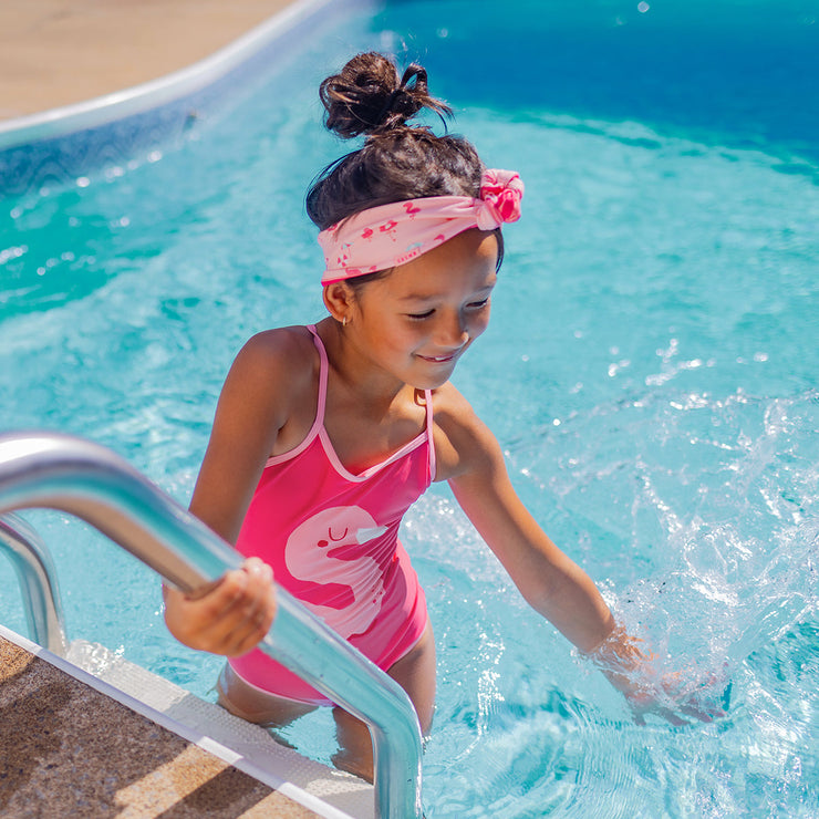 Maillot de bain une pièce rose réversible à rayures, enfant