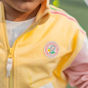 Détails de la veste jaune en coton français, enfant