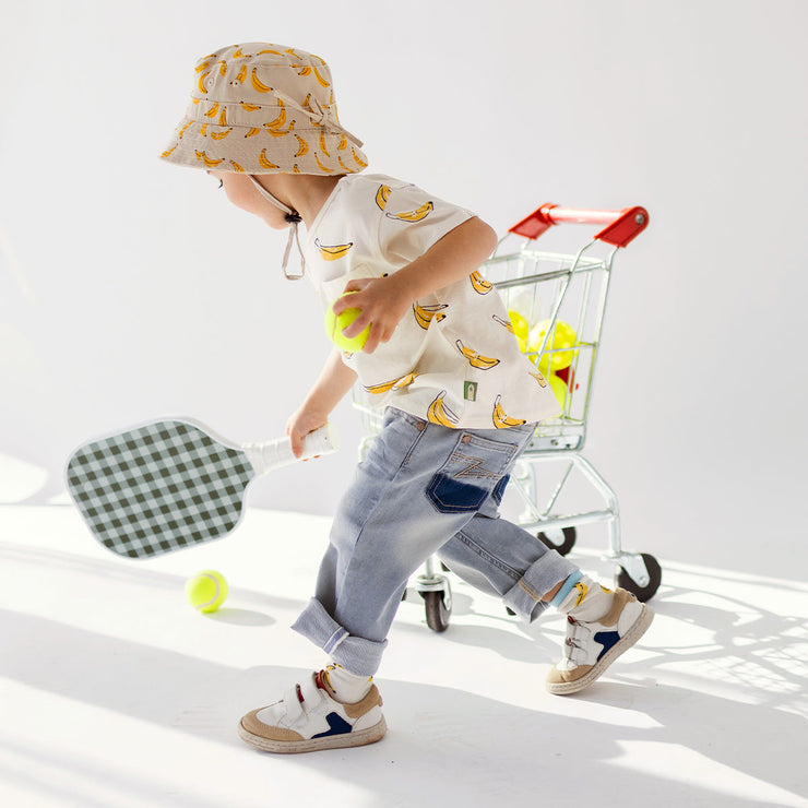 Look du t-shirt crème à motifs de bananes, bébé