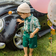 Look du short vert en lin et coton, bébé