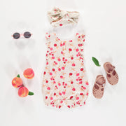 Une-pièce coupe ample beige avec motif de cerises en viscose, bébé  || Loose fit cream one piece with cherry print in viscose, baby 
