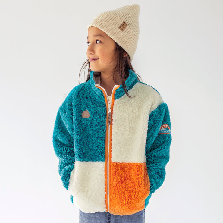 Veste en peluche bleue avec blocs de couleur, enfant