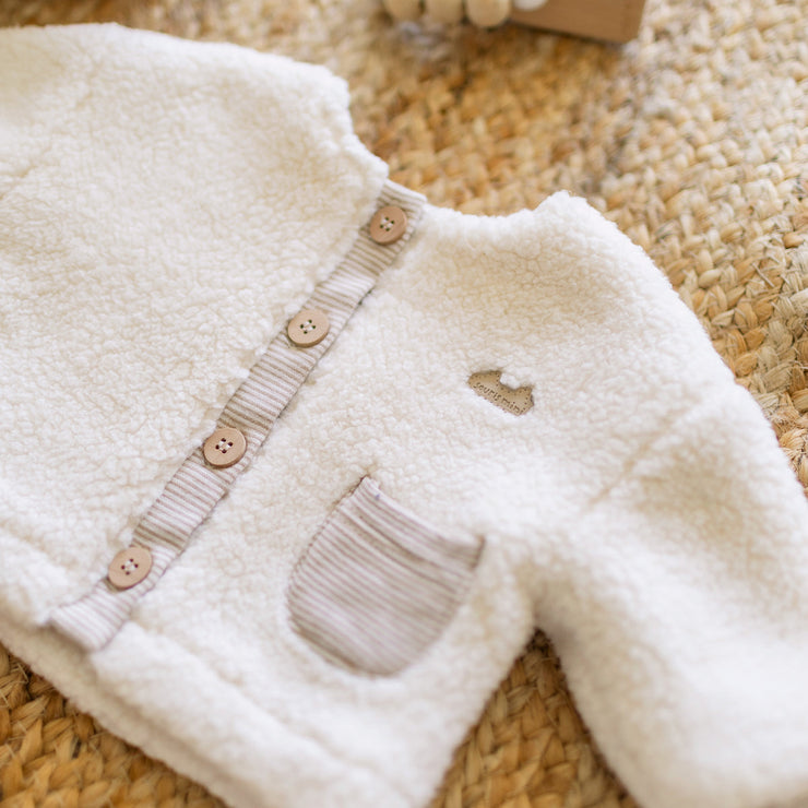 Présentation de la veste crème en sherpa, naissance