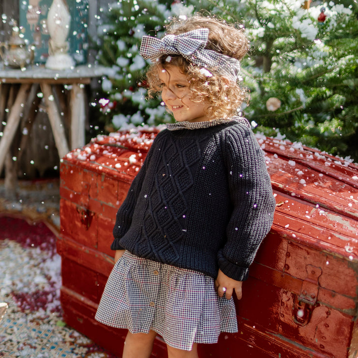 Chandail en tricot noir au motif tressé, bébé