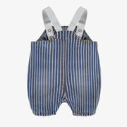 Dos de la salopette bleue et blanche en denim à rayures, naissance