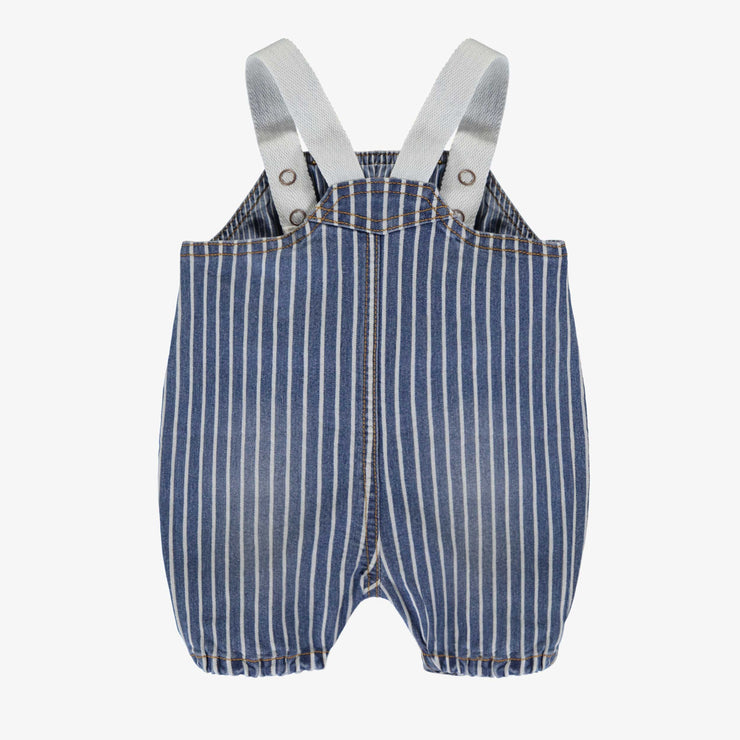 Dos de la salopette bleue et blanche en denim à rayures, naissance