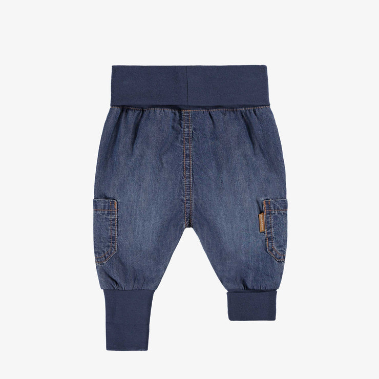 Pantalon évolutif en denim, naissance