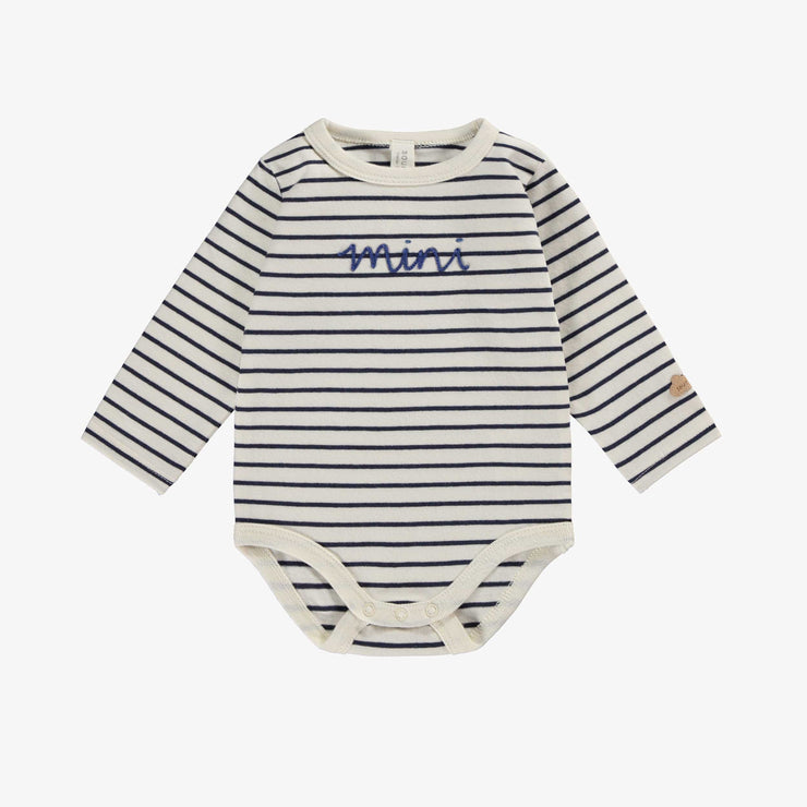 Cache-couche crème à rayures bleues, naissance