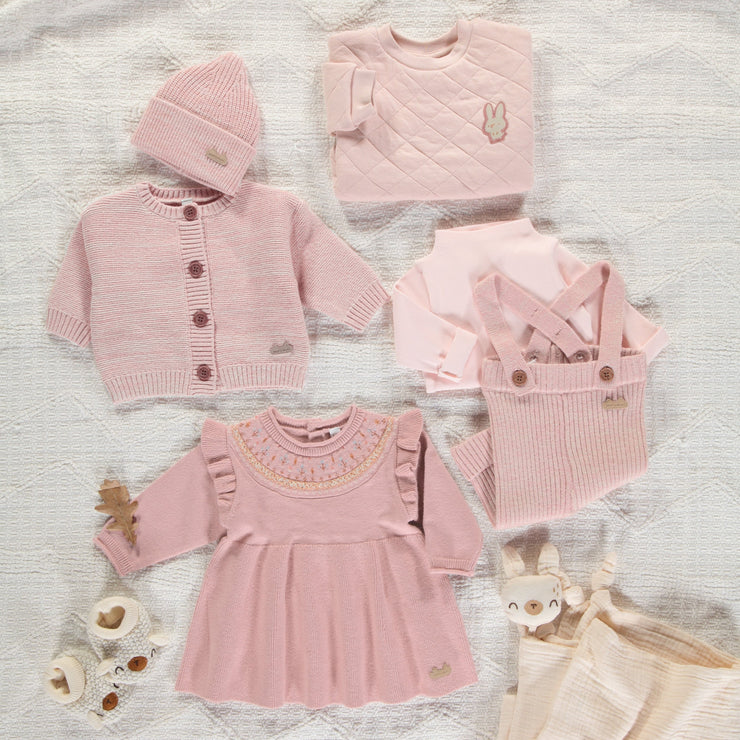 Pantalon en tricot rose chiné à bretelles effet angora, naissance