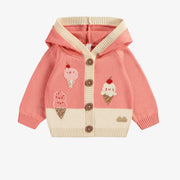 Veste de maille manches longues capuchon corail et crème à motif jacquard, naissance || Long sleeve knitted cardigan with coral and cream hood and jacquard pattern, newborn