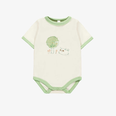 Cache-couche manches longues crème avec illustration en coton biologique, naissance || Cream short-sleeved bodysuit with an illustration in organic cotton, newborn