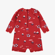 Dos du maillot de bain une pièce rouge à motifs, bébé