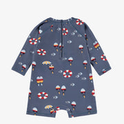 Dos du maillot de bain une pièce bleu marine à motifs, bébé