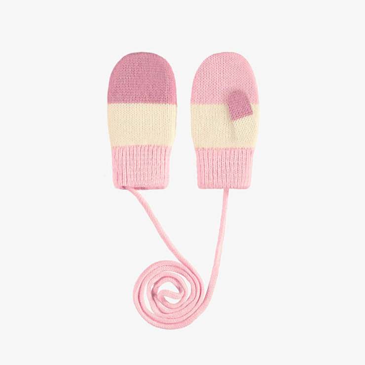 Mitaines de tricot roses et crème avec cordon, bébé
