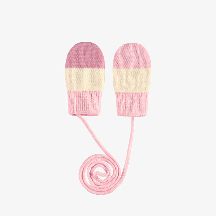 Mitaines de tricot roses et crème avec cordon, bébé