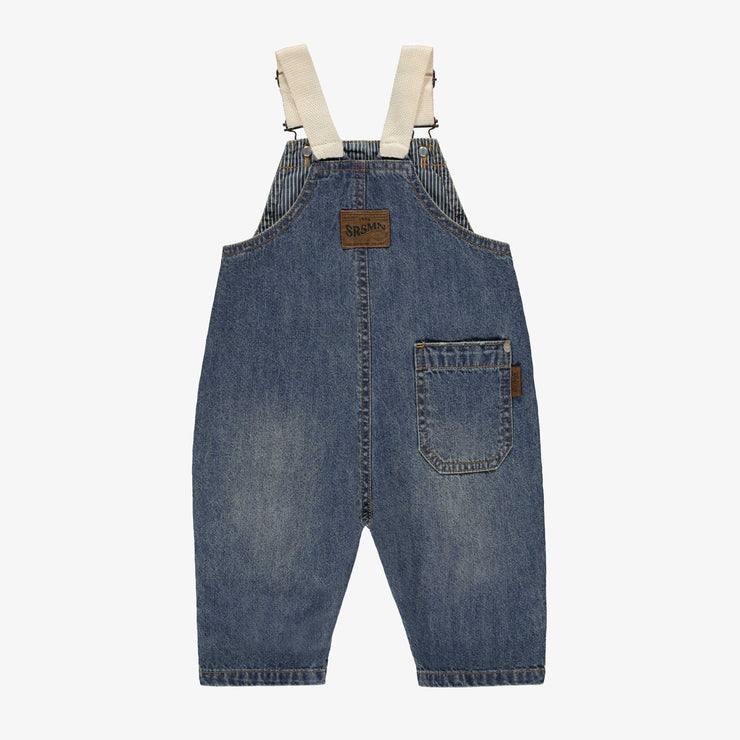 Dos de la salopette en denim bleu avec broderie, bébé