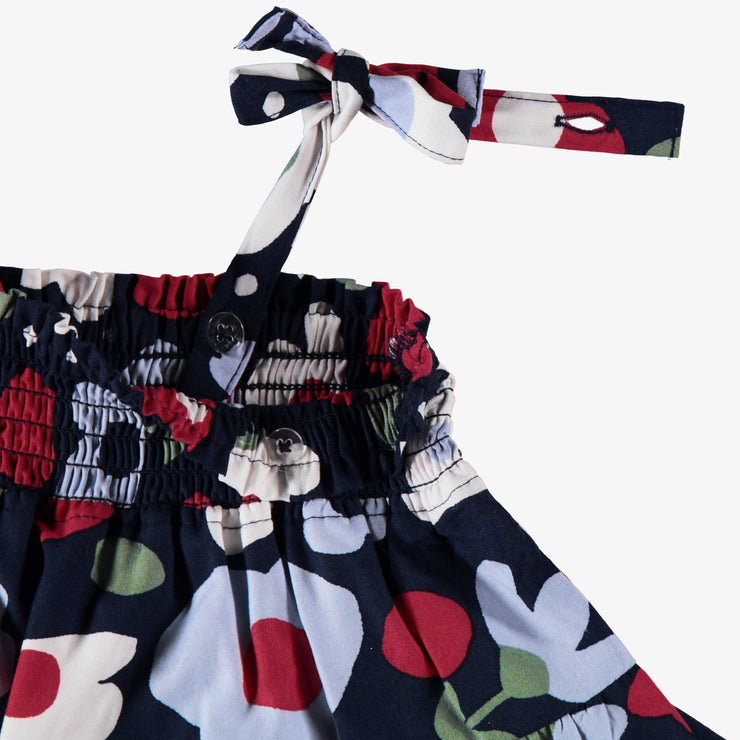 Détail de la robe marine à motif de floral, bébé