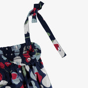 Détail de la robe marine à motifs de fleurs, enfant