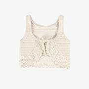 Dos de la camisole crème en tricot crocheté, enfant