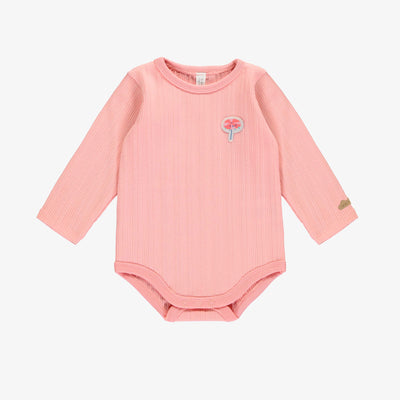 Cache-couche rose en tricot côtelé, naissance