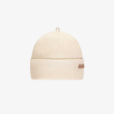 Bonnet crème en tricot côtelé irrégulier, naissance