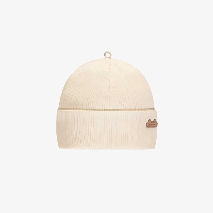 Bonnet crème en tricot côtelé irrégulier, naissance