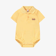 Cache-couche jaune en piqué avec col polo, naissance