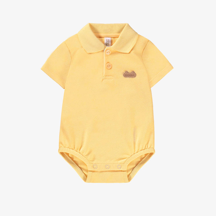 Cache-couche jaune en piqué avec col polo, naissance