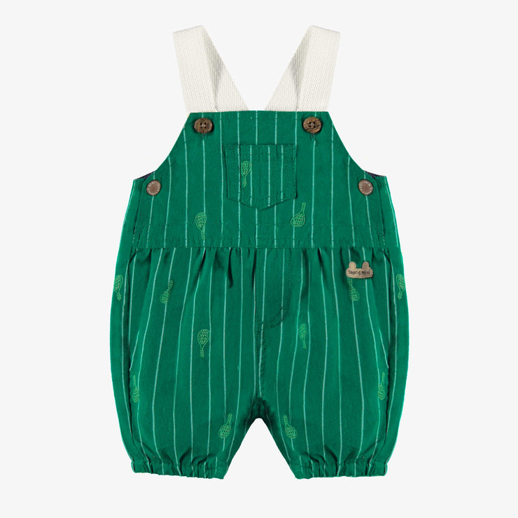 Salopette verte à rayures et motifs, naissance