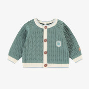 Cardigan en tricot turquoise cendré avec torsades verticales, naissance