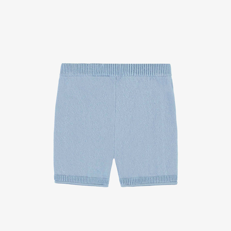 Dos du short bleu pâle en tricot, naissance