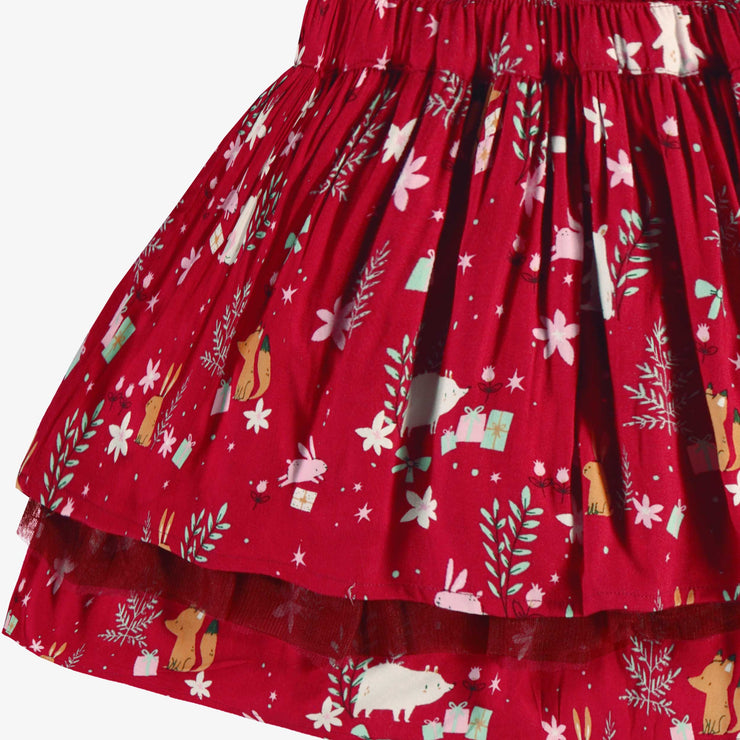 Zoom détails de la jupe rouge à motifs festifs, enfant
